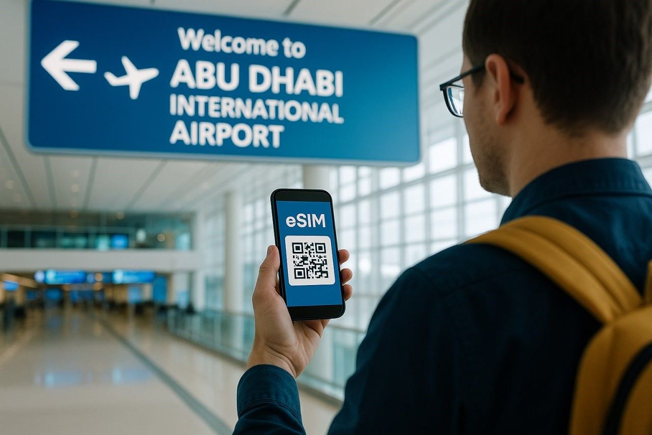 A digital traveler scanning a QR code on their smartphone for eSIM activation inside Abu Dhabi International Airport