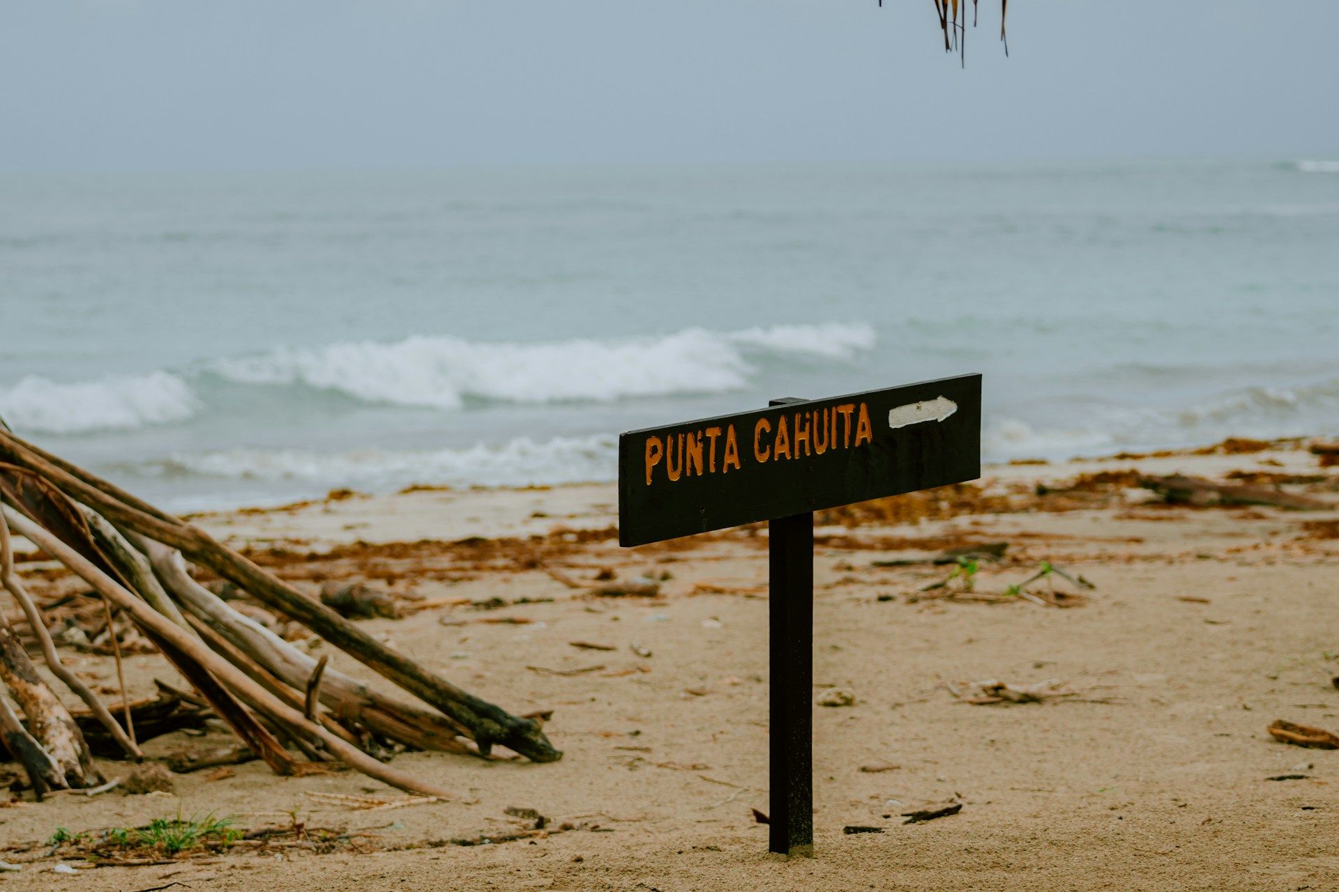 cahuita-national-park-beach-with-sign