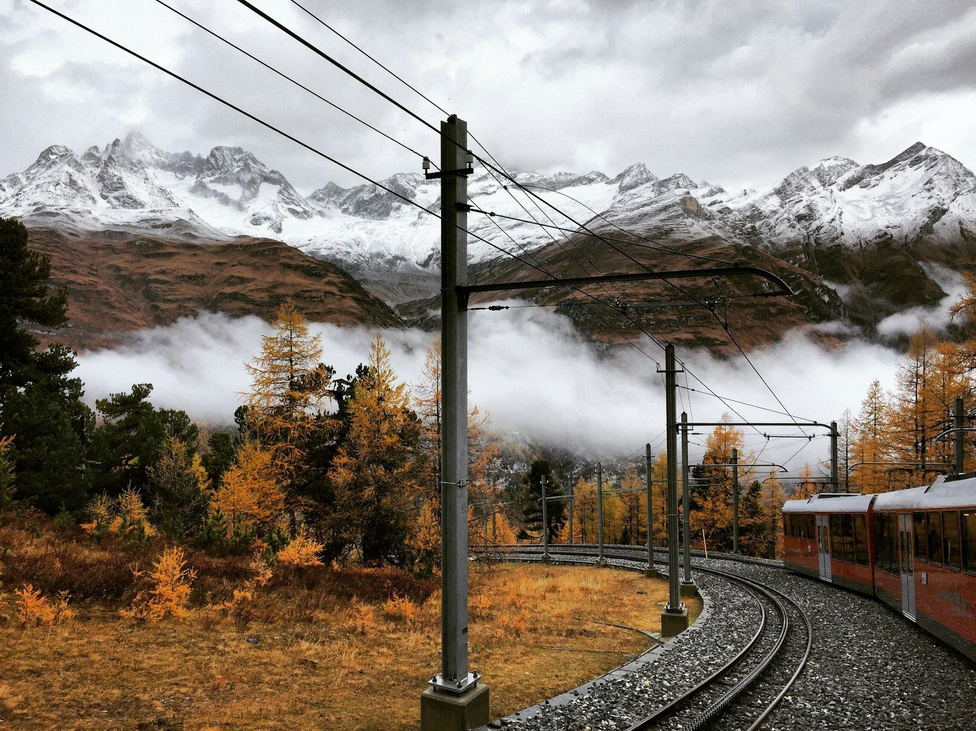 switzer-train-with-cloud-and-mountains