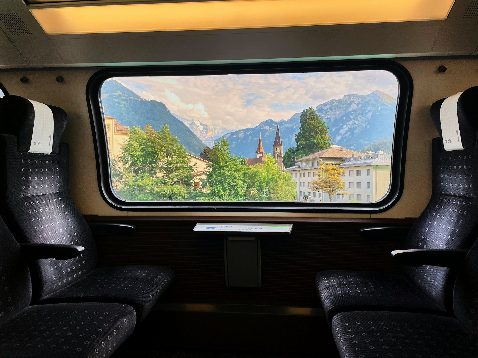 trains-window-with-old-stone-village