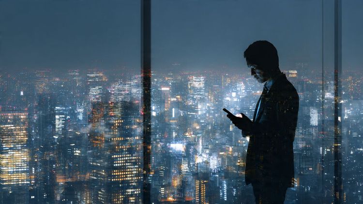 A business traveler in Tokyo using a smartphone with skyline lights reflecting on glass, symbolizing seamless internet connectivity and modern travel efficiency