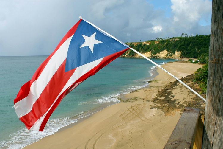 Puerto Rico flag in the beach