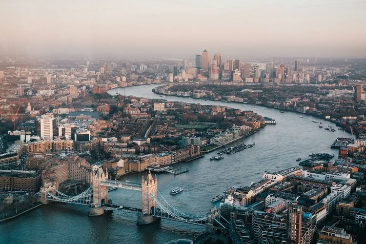 Aerial view of London’s Thames River and the iconic Tower Bridge