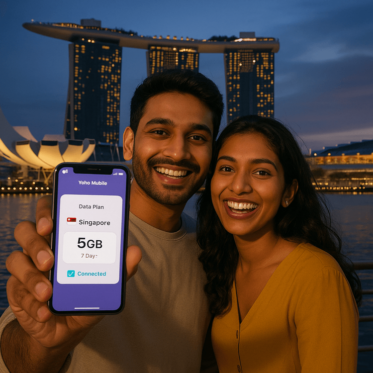An Indian couple happily using a Yoho Mobile eSIM on their phone while traveling in Singapore.