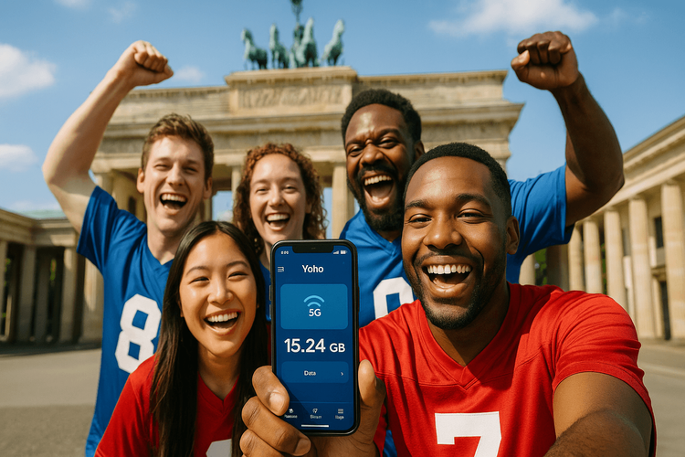 Excited NFL fans using a Yoho Mobile eSIM for connectivity while sightseeing in Europe before an international game.