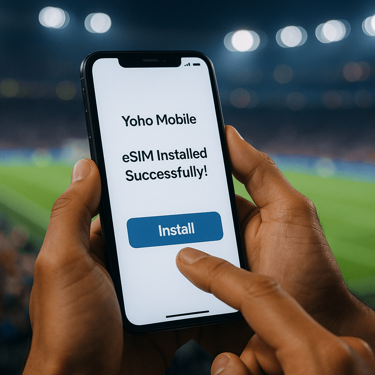 A user quickly installing a Yoho Mobile eSIM on their smartphone before a football match.