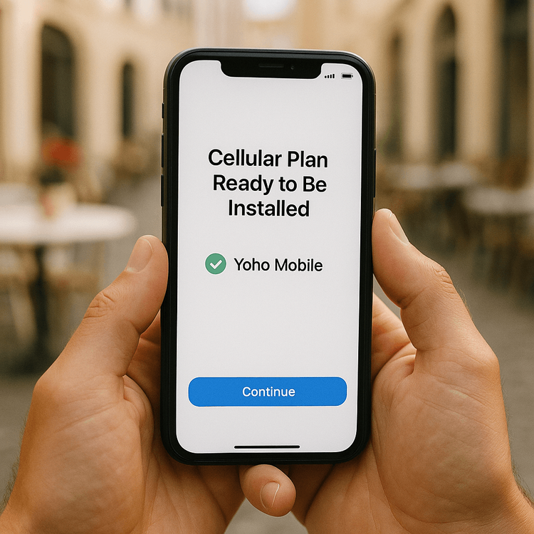 A close-up of an iPhone 11 screen showing the simple, one-tap Yoho Mobile eSIM installation process for iOS.