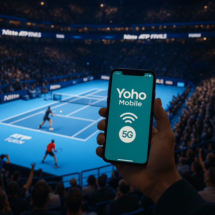 A tennis fan using a Yoho Mobile eSIM on their smartphone to stay connected at the ATP Finals in Turin.