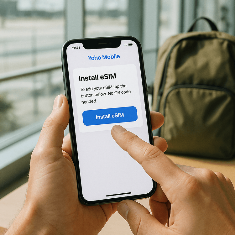 A user easily installing their Yoho Mobile eSIM on an iPhone with a single tap, no QR code needed.