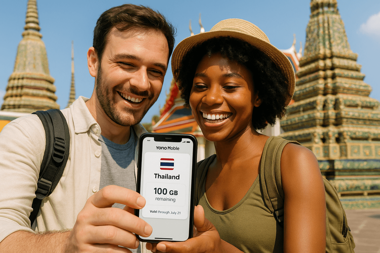 A happy couple using a Yoho Mobile eSIM on their phone while traveling through Thailand.