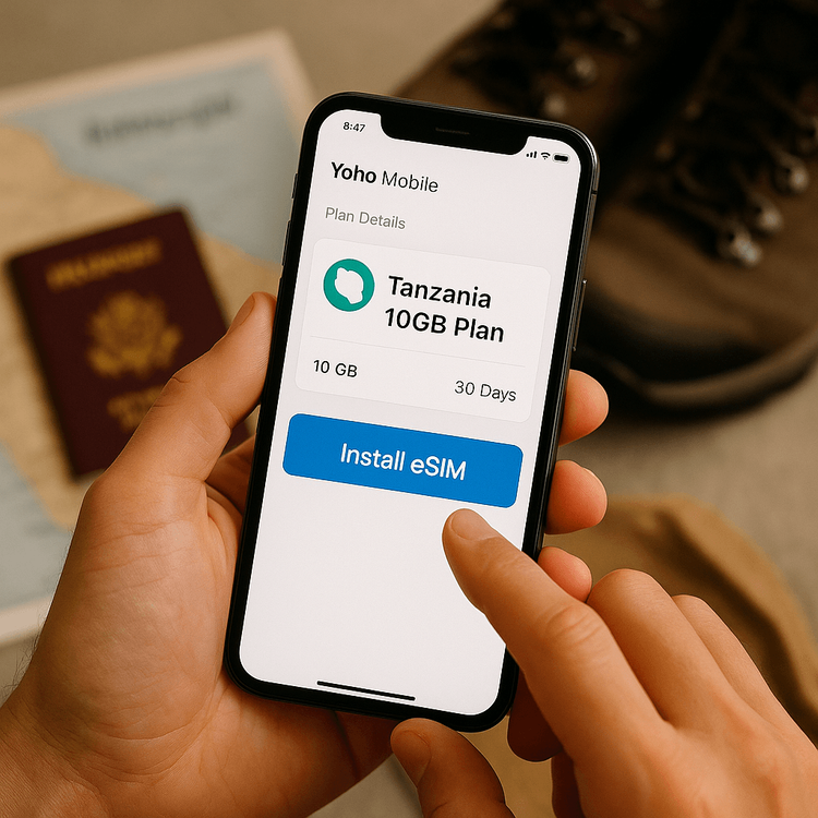 A user easily setting up their Yoho Mobile Tanzania eSIM plan on their smartphone before their trip.
