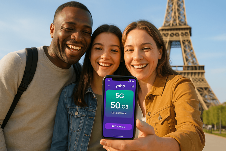A happy family on vacation in Paris using a Yoho Mobile eSIM for navigation and staying connected.
