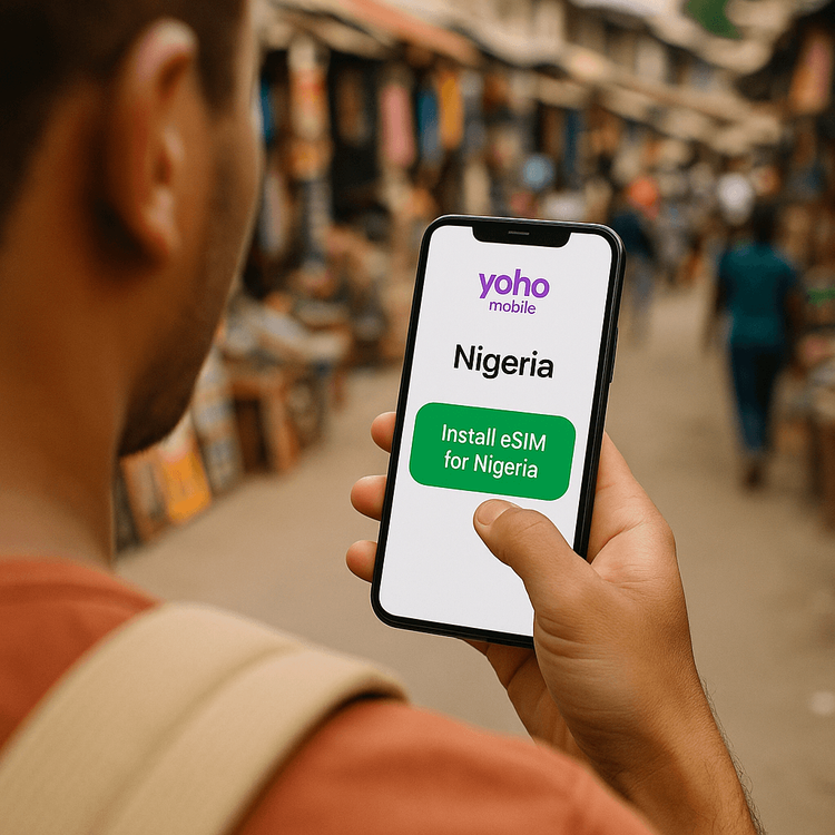 A traveler activating their Yoho Mobile eSIM for Nigeria on their smartphone via the app.