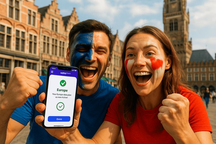 Excited football fans using Yoho Mobile eSIM on their smartphone during a trip to Bruges for a match.