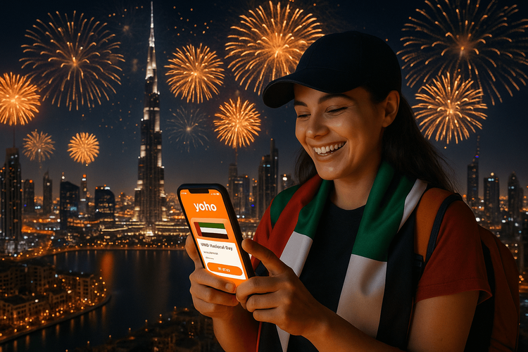 Traveler using Yoho Mobile eSIM to stay connected during UAE National Day fireworks in Dubai.