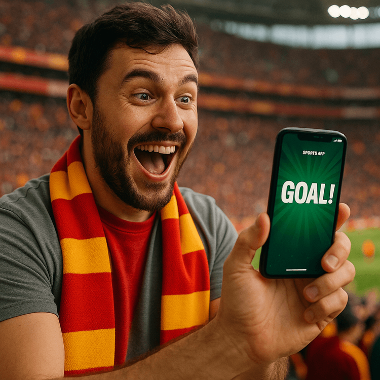 A Galatasaray fan celebrating a goal while checking his smartphone in the stadium, connected with a travel eSIM.