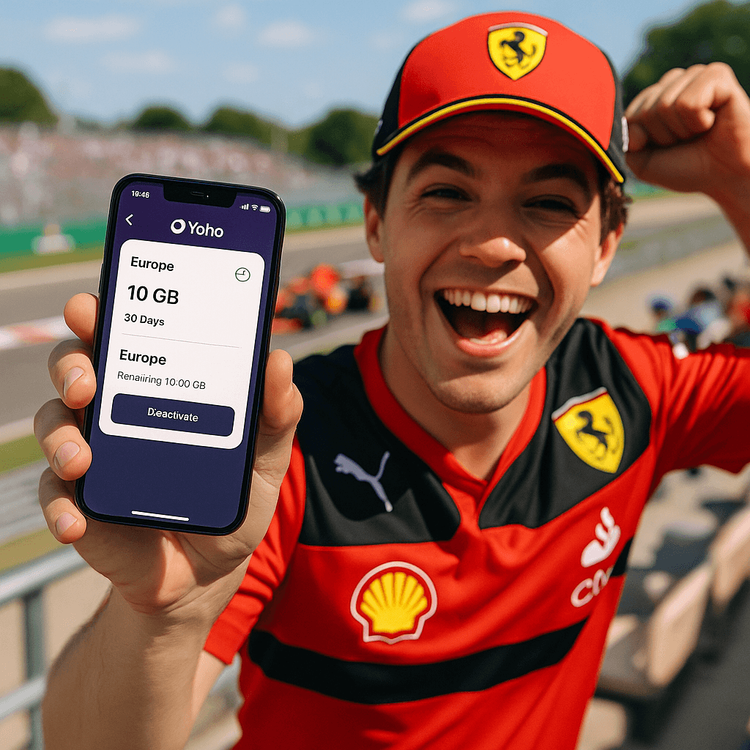 A fan using a Yoho Mobile eSIM on their phone to stay connected at a Formula 1 race.
