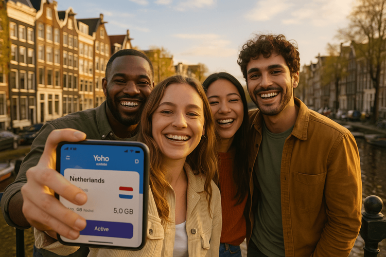 A group of friends using a Yoho Mobile eSIM to share their travel moments by a canal in Amsterdam.