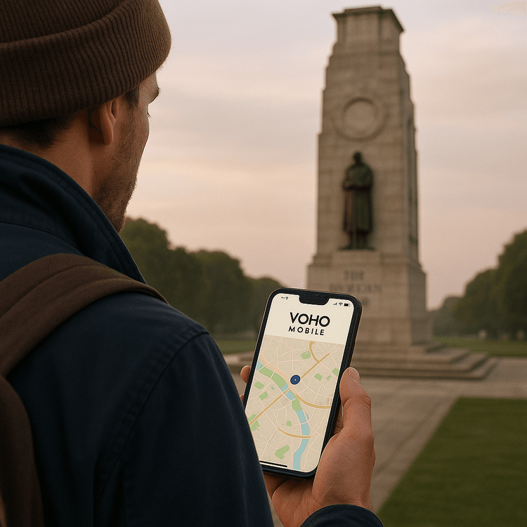 A traveler using a Yoho Mobile eSIM on their phone to navigate to an Anzac Day memorial service.