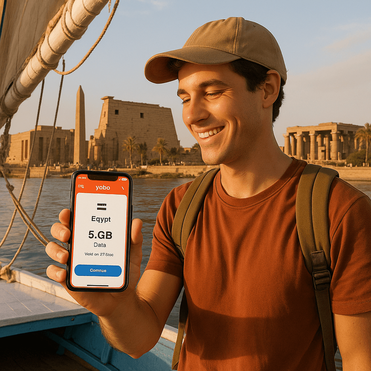 Traveler using a Yoho Mobile eSIM for Egypt on a boat on the Nile in Luxor.
