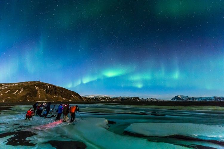 Watching glowing waves of green, pink, and purple dance across the Arctic sky 