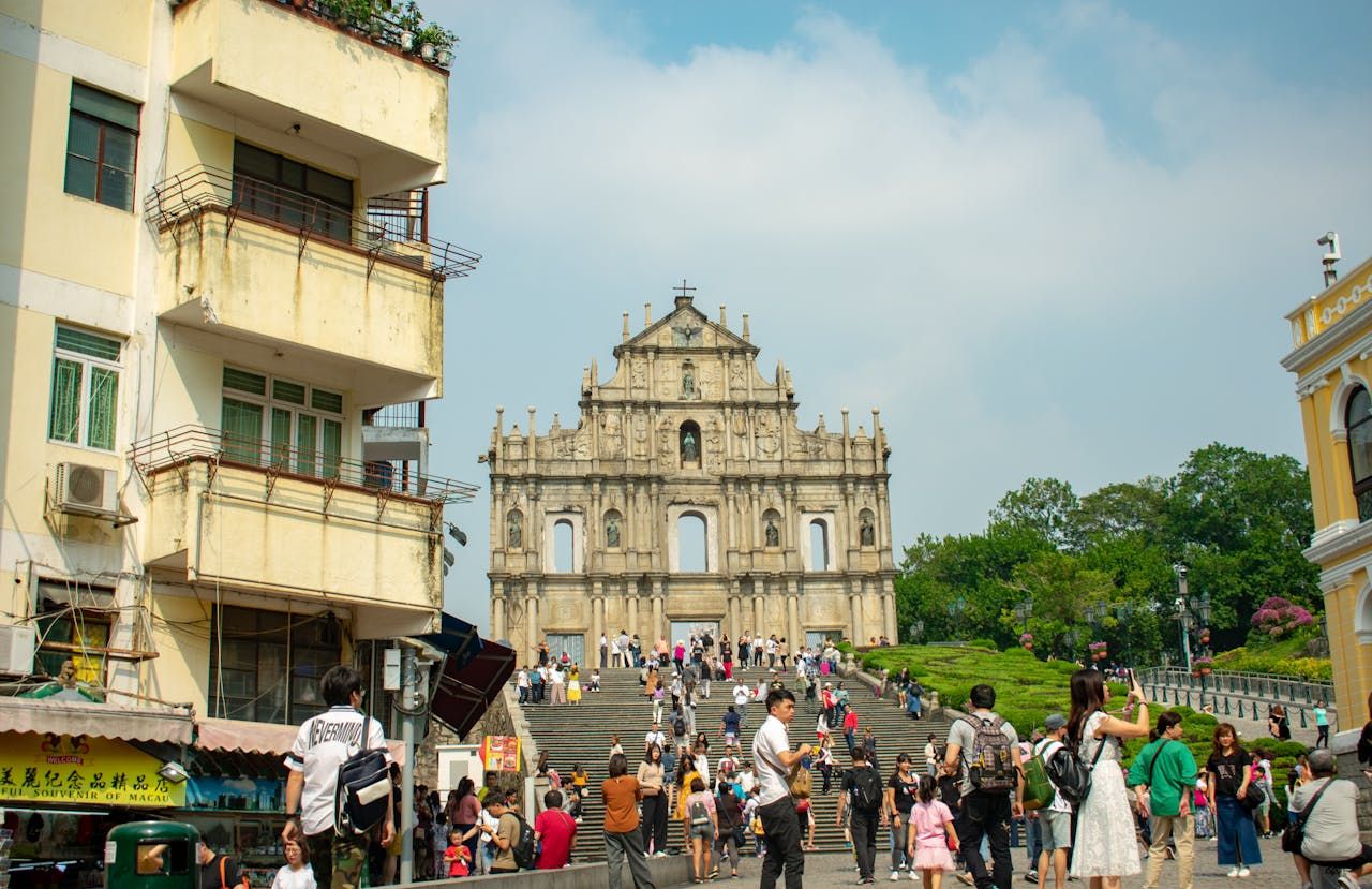 Begin in the UNESCO-listed Historic Centre, where cobbled streets lead naturally to the Ruins of St. Paul’s