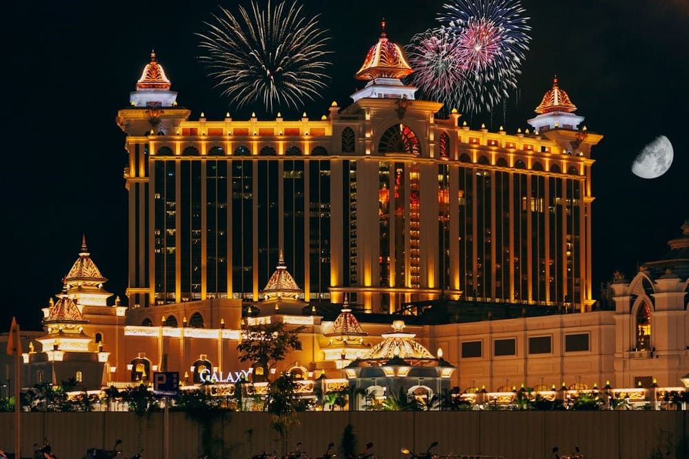 Exterior of modern luxury hotel complex at night