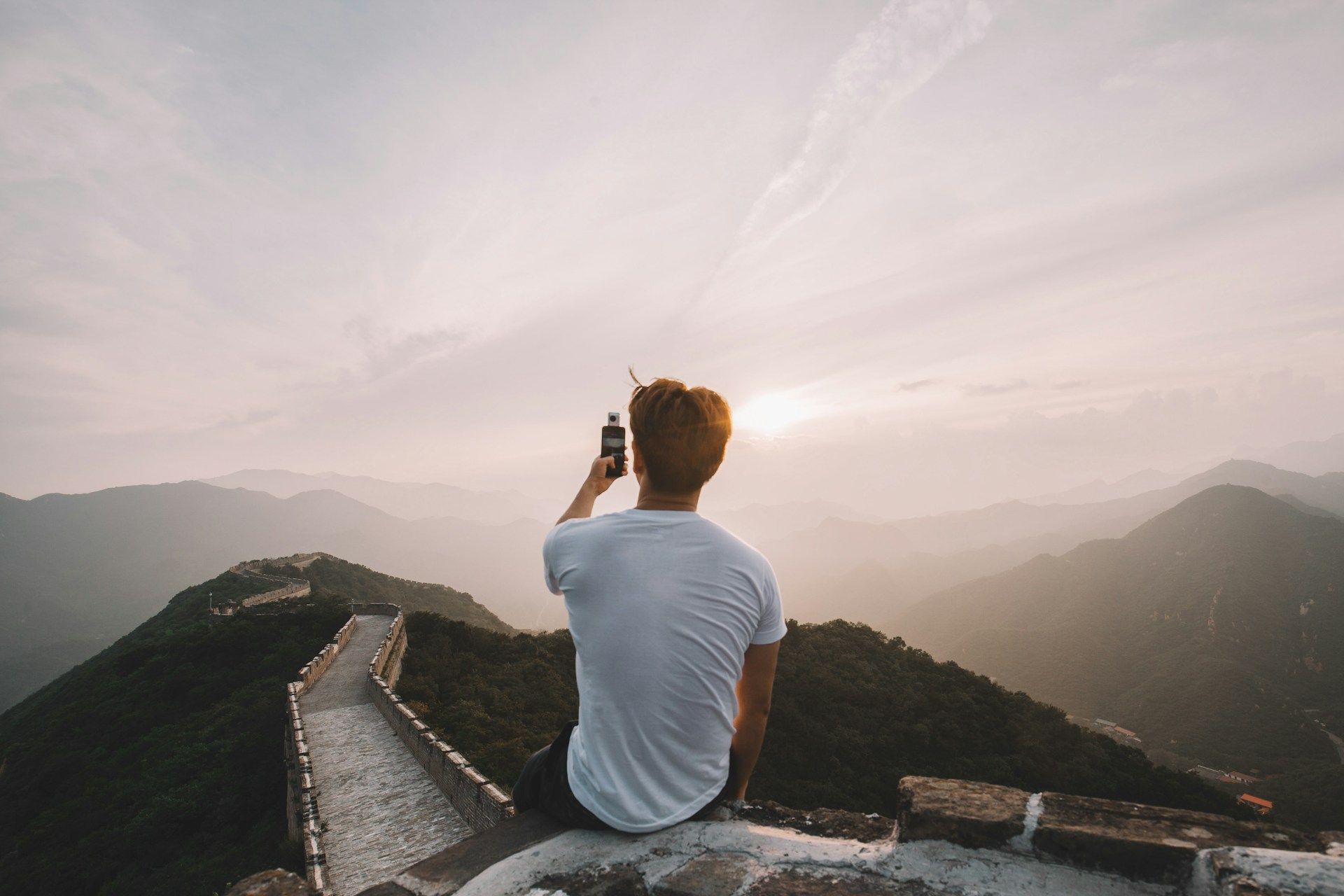 person-taking-a-picture-in-the-great-wall