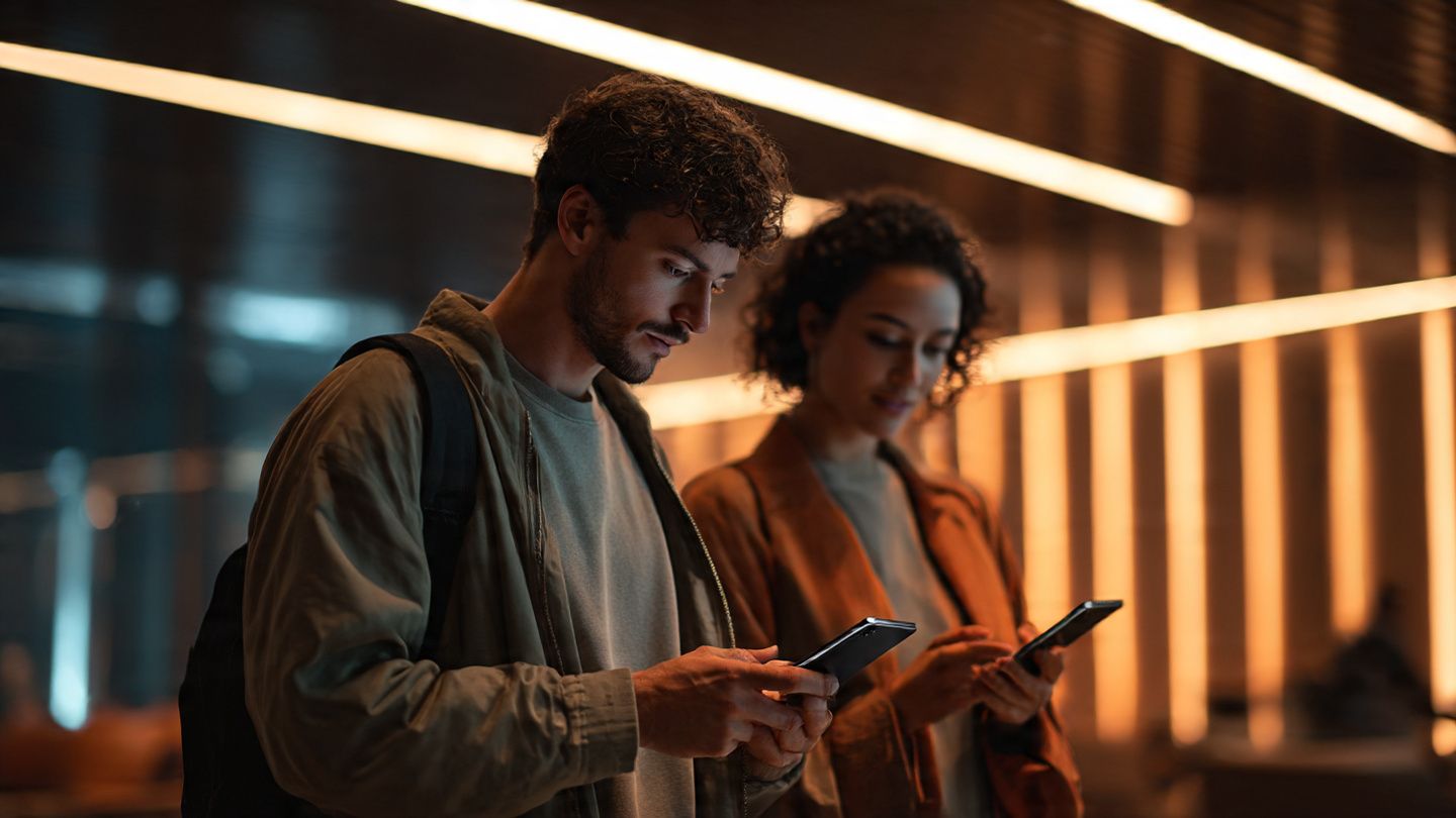 Travelers at an airport lounge using an OPPO Find X9 to activate an eSIM, soft ambient lighting, modern tech-travel aesthetic, step-by-step instructional mood.